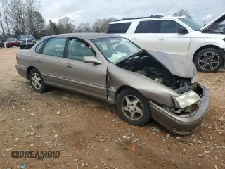 1998 Toyota Avalon XL with VIN 4T1BF18B2WU242403, listed as a Copart auction lot 50146335 with Not Provided miles and Salvage Title. Bid and sale history available at DreamBid. Image 4.