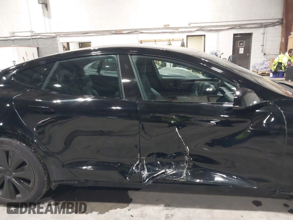 2022 Tesla Model S with VIN 5YJSA1E58NF478403, listed as a IAAI auction lot 41533099 with 42,779 mi miles and . Bid and sale history available at DreamBid. Image 6.