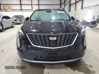 2020 Cadillac XT4 FWD Premium Luxury z VIN 1GYFZCR41LF143039, wystawiony jako Copart lot #57164005 z przebiegiem 24 218 mil mil oraz Nie do naprawy • Non repairable. Historia ofert i sprzedaży dostępna na DreamBid. Obrazek 5.