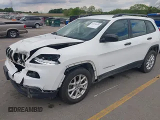 2015 Jeep Cherokee Sport z VIN 1C4PJMAB6FW773872, wystawiony jako IAAI lot #42376516 z przebiegiem 135 209 mil mil oraz . Historia ofert i sprzedaży dostępna na DreamBid. Obrazek 2.