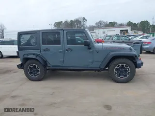 2015 Jeep Wrangler Unlimited Rubicon Hard Rock with VIN 1C4HJWFG1FL679873, listed as a IAAI auction lot 41508722 with 97,165 mi miles. Bid and sale history available at carsss.com. Image 13.