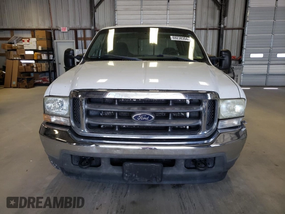 2002 Ford F-250 XL with VIN 1FTNW20S72EB45107, listed as a Copart auction lot 69238304 with 205,294 mi miles and Salvage Title. Bid and sale history available at DreamBid. Image 5.
