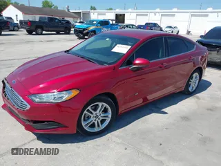 2018 Ford Fusion SE z VIN 3FA6P0LU9JR279976, wystawiony jako IAAI lot #41792558 z przebiegiem 115 790 mil mil oraz . Historia ofert i sprzedaży dostępna na DreamBid. Obrazek 2.