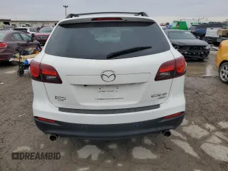 2015 Mazda CX-9 Touring z VIN JM3TB3CV3F0450354, wystawiony jako Copart lot #42934625 z przebiegiem Nie podano mil oraz Szkoda całkowita • Salvage title. Historia ofert i sprzedaży dostępna na DreamBid. Obrazek 6.
