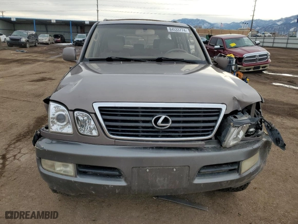 1999 Lexus LX 470 Luxury SUV with VIN JT6HT00WXX0052090, listed as a Copart auction lot 84533774 with NaN miles and Salvage Title. Bid and sale history available at carsss.com. Image 5.