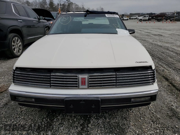 1987 Oldsmobile Toronado with VIN 1G3EZ1130HU307201, listed as a Copart auction lot 49290815 with 104,837 mi miles and Salvage Title. Bid and sale history available at DreamBid. Image 5.