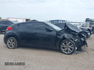 2016 Hyundai Veloster with VIN KMHTC6AD6GU251094, listed as a IAAI auction lot 41971550 with 97,744 mi miles. Bid and sale history available at carsss.com. Image 13.