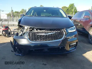 2022 Chrysler Pacifica Touring L with VIN 2C4RC1BG9NR117538, listed as a IAAI auction lot 42318518 with 103,311 mi miles and . Bid and sale history available at DreamBid. Image 13.
