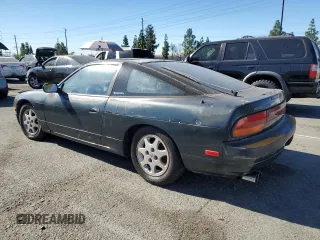 1992 Nissan 240SX SE Limited Edition z VIN JN1MS36PXNW115066, wystawiony jako Copart lot #80294264 z przebiegiem 91 190 mil mil oraz Szkody całkowita. Historia ofert i sprzedaży dostępna na DreamBid. Obrazek 2.