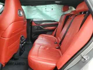 2016 BMW X5 M z VIN 5YMKT6C51G0R77692, wystawiony jako Copart lot #81979013 z przebiegiem 56 774 mil mil oraz . Historia ofert i sprzedaży dostępna na DreamBid. Obrazek 11.