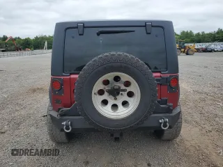 2012 Jeep Wrangler Sport z VIN 1C4AJWAG7CL105511, wystawiony jako Copart lot #62822985 z przebiegiem 137 520 mil mil oraz Czysty tytuł • Clean title. Historia ofert i sprzedaży dostępna na DreamBid. Obrazek 6.