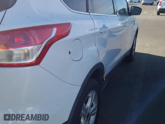 2013 Ford Escape SE z VIN 1FMCU9GX2DUB46936, wystawiony jako IAAI lot #42792269 z przebiegiem 196 885 mil mil oraz . Historia ofert i sprzedaży dostępna na DreamBid. Obrazek 37.
