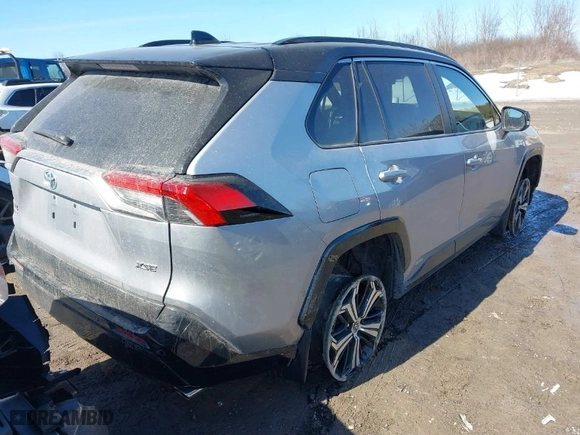 2021 Toyota RAV4 Prime XSE with VIN JTMFB3FV6MD069556, listed as a IAAI auction lot 41740590 with 15,720 mi miles. Bid and sale history available at carsss.com. Image 4.