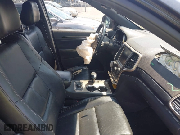 2014 Jeep Grand Cherokee Limited with VIN 1C4RJFBTXEC140898, listed as a IAAI auction lot 42793097 with 159,542 mi miles and . Bid and sale history available at DreamBid. Image 5.