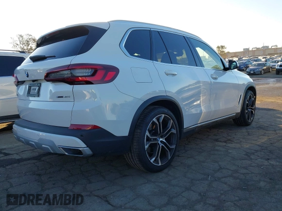 2021 BMW X5 sDrive40i with VIN 5UXCR4C03M9G59554, listed as a IAAI auction lot 41358056 with 47,577 mi miles. Bid and sale history available at carsss.com. Image 4.