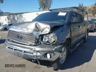 2008 Toyota Tundra z VIN 5TFEV54178X038920, wystawiony jako IAAI lot #41668006 z przebiegiem 217 053 mil mil oraz . Historia ofert i sprzedaży dostępna na DreamBid. Obrazek 17.