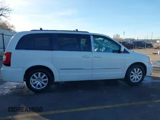 2013 Chrysler Town & Country Touring with VIN 2C4RC1BG7DR674253, listed as a IAAI auction lot 41854303 with 171,502 mi miles. Bid and sale history available at carsss.com. Image 13.