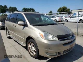2004 Toyota Sienna XLE with VIN 5TDBA22C24S001405, listed as a Copart auction lot 56316385 with 293,077 mi miles and Clean Title. Bid and sale history available at DreamBid. Image 4.