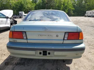 1992 Toyota Tercel z VIN JT2EL43B1N0209927, wystawiony jako Copart lot #57595275 z przebiegiem 87 577 mil mil oraz Tytuł czysty. Historia ofert i sprzedaży dostępna na DreamBid. Obrazek 6.