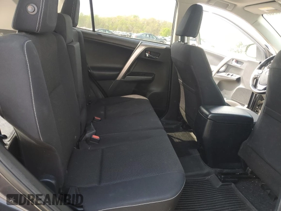 2018 Toyota RAV4 XLE with VIN JTMRFREV2JJ215776, listed as a Copart auction lot 51745205 with 52,009 mi miles and Salvage Title. Bid and sale history available at DreamBid. Image 11.