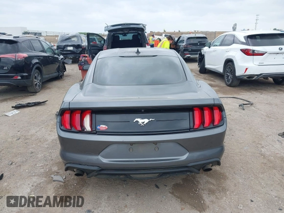 2021 Ford Mustang EcoBoost with VIN 1FA6P8TH1M5152941, listed as a IAAI auction lot 42110646 with 26,673 mi miles and . Bid and sale history available at DreamBid. Image 16.