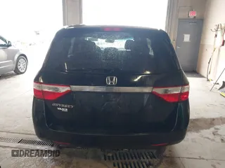 2012 Honda Odyssey EX z VIN 5FNRL5H4XCB017557, wystawiony jako IAAI lot #42367322 z przebiegiem 209 630 mil mil oraz . Historia ofert i sprzedaży dostępna na DreamBid. Obrazek 16.