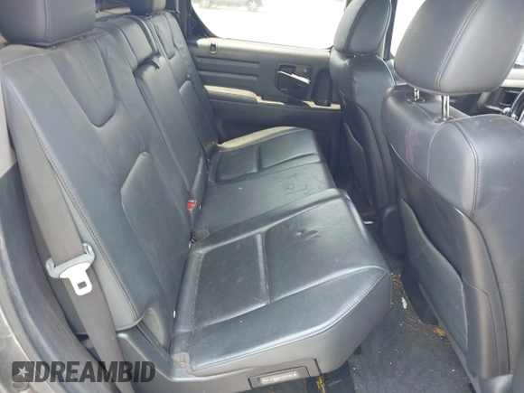 2013 Honda Ridgeline RTL with VIN 5FPYK1F5XDB012354, listed as a IAAI auction lot 42392921 with 248,223 mi miles and . Bid and sale history available at DreamBid. Image 8.