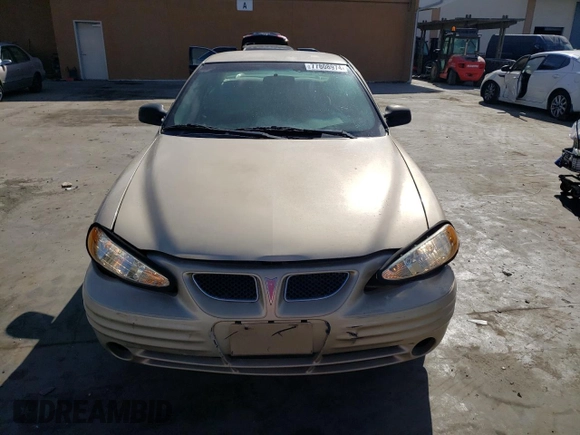 2001 Pontiac Grand Am SE z VIN 1G2NE52T91M583582, wystawiony jako Copart lot #77808974 z przebiegiem 126 219 mil mil oraz Szkoda całkowita • Salvage title. Historia ofert i sprzedaży dostępna na DreamBid. Obrazek 5.