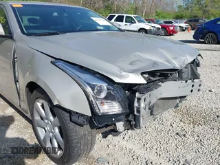 2014 Cadillac ATS Standard AWD z VIN 1G6AG5RXXE0167182, wystawiony jako IAAI lot #42103760 z przebiegiem 66 653 mil mil oraz . Historia ofert i sprzedaży dostępna na DreamBid. Obrazek 18.