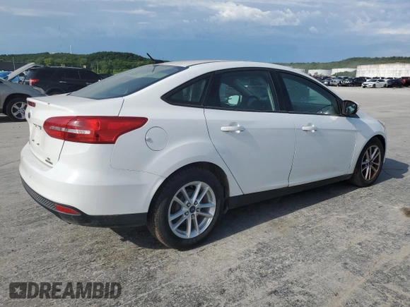 2015 Ford Focus SE with VIN 1FADP3F2XFL220072, listed as a Copart auction lot 58058255 with 128,871 mi miles and Clean title. Bid and sale history available at DreamBid. Image 3.