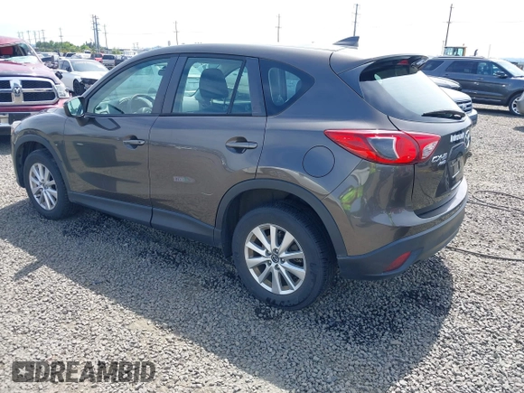 2016 Mazda CX-5 Sport with VIN JM3KE4BY8G0785812, listed as a IAAI auction lot 42324083 with 57,405 mi miles and . Bid and sale history available at DreamBid. Image 3.