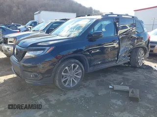 2019 Honda Passport Elite z VIN 5FNYF8H07KB014647, wystawiony jako IAAI lot #41544464 z przebiegiem 82 698 mil mil oraz . Historia ofert i sprzedaży dostępna na DreamBid. Obrazek 2.
