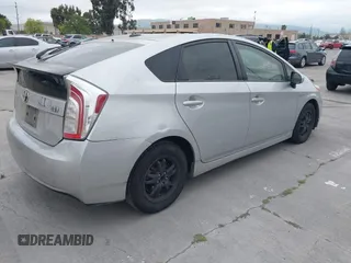 2014 Toyota Prius Four with VIN JTDKN3DU4E1748583, listed as a IAAI auction lot 42044872 with 215,032 mi miles. Bid and sale history available at carsss.com. Image 4.