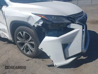 2018 Lexus RX 350 z VIN 2T2BZMCAXJC144930, wystawiony jako IAAI lot #41857778 z przebiegiem 108 191 mil mil oraz . Historia ofert i sprzedaży dostępna na DreamBid. Obrazek 17.