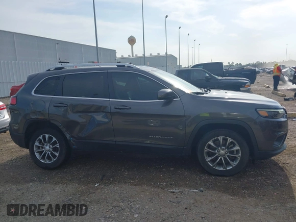 2019 Jeep Cherokee Latitude Plus with VIN 1C4PJLLB2KD403502, listed as a IAAI auction lot 42026964 with 57,000 mi miles and . Bid and sale history available at DreamBid. Image 13.