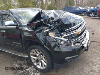 2015 Chevrolet Suburban LTZ with VIN 1GNSKKKC5FR255373, listed as a IAAI auction lot 42012528 with 219,030 mi miles and . Bid and sale history available at DreamBid. Image 6.