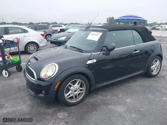 2010 MINI Cooper Convertible S with VIN WMWMS3C52ATY08772, listed as a IAAI auction lot 41845412 with 71,215 mi miles. Bid and sale history available at carsss.com. Image 2.