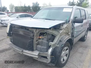 2015 Honda Pilot LX with VIN 5FNYF3H21FB010426, listed as a IAAI auction lot 41901870 with 184,113 mi miles and . Bid and sale history available at carsss.com. Image 6.