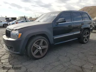 2007 Jeep Grand Cherokee SRT-8 with VIN 1J8HR78357C502665, listed as a Copart auction lot 84772624 with 153,311 mi miles and Clean Title. Bid and sale history available at carsss.com. Image 1.