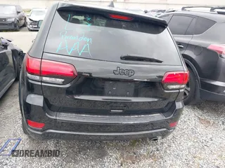 2021 Jeep Grand Cherokee Laredo X with VIN 1C4RJEAG9MC681776, listed as a IAAI auction lot 42116720 with 51,503 mi miles and . Bid and sale history available at DreamBid. Image 16.