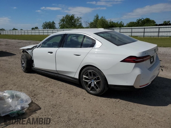 2024 BMW i5 eDrive40 with VIN WBY33FK05RCR50188, listed as a Copart auction lot 52953195 with 423 mi miles and Salvage title. Bid and sale history available at DreamBid. Image 2.