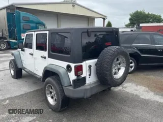 2013 Jeep Wrangler Unlimited Sport with VIN 1C4BJWDG6DL582321, listed as a Copart auction lot 61109125 with 182,953 mi miles and Clean title. Bid and sale history available at DreamBid. Image 3.