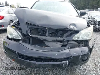 2006 Lexus RX 400h z VIN JTJHW31U260041868, wystawiony jako IAAI lot #41985843 z przebiegiem 176 313 mil mil oraz . Historia ofert i sprzedaży dostępna na DreamBid. Obrazek 6.