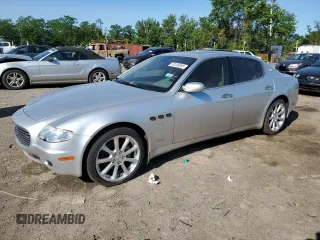 2005 Maserati Quattroporte z VIN ZAMCE39AX50019962, wystawiony jako Copart lot #59158555 z przebiegiem 24 013 mil mil oraz Czysty tytuł • Clean title. Historia ofert i sprzedaży dostępna na DreamBid. Obrazek 2.
