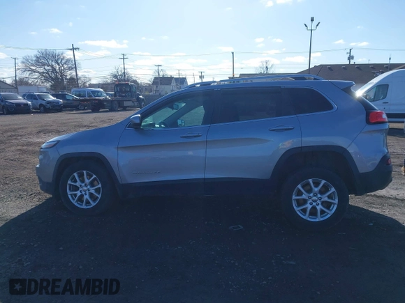 2014 Jeep Cherokee Latitude with VIN 1C4PJMCBXEW107559, listed as a IAAI auction lot 41859246 with 94,812 mi miles and . Bid and sale history available at DreamBid. Image 14.