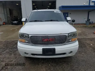 2003 GMC Yukon XL with VIN 1GKFK66U83J313981, listed as a Copart auction lot 65121004 with 301,229 mi miles and Clean Title. Bid and sale history available at carsss.com. Image 5.