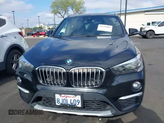 2019 BMW X1 sDrive28i with VIN WBXHU7C59K5L12320, listed as a IAAI auction lot 42116860 with 28,183 mi miles and . Bid and sale history available at DreamBid. Image 13.