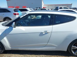 2016 Hyundai Veloster z VIN KMHTC6AD3GU267365, wystawiony jako IAAI lot #41469796 z przebiegiem 111 791 mil mil oraz . Historia ofert i sprzedaży dostępna na DreamBid. Obrazek 15.
