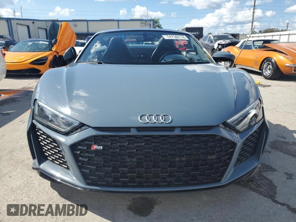 2020 Audi R8 z VIN WUAVECFX5L7901778, wystawiony jako Copart lot #74736714 z przebiegiem Nie podano mil oraz Nie do naprawy • Non repairable. Historia ofert i sprzedaży dostępna na DreamBid. Obrazek 5.