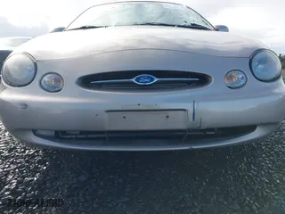 1999 Ford Taurus SE with VIN 1FAFP53U0XG209151, listed as a IAAI auction lot 41778371 with 107,262 mi miles. Bid and sale history available at carsss.com. Image 6.